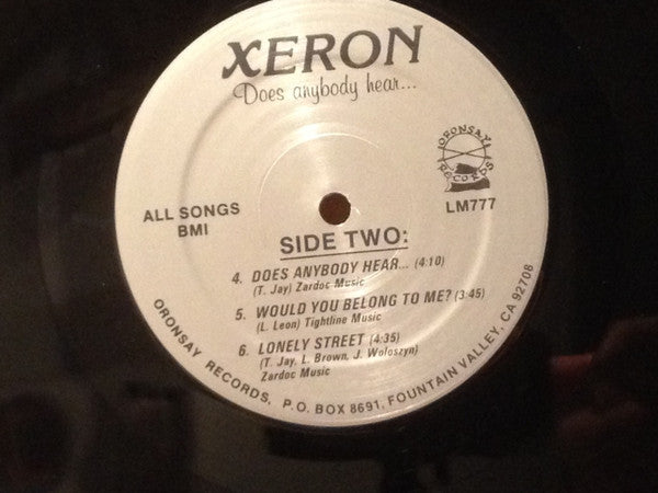 Xeron : Does Anybody Hear.... (12", MiniAlbum)